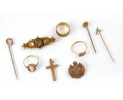 A selection of jewellery, including an Edwardian 9ct yellow gold brooch, set with a diamond to the centre, stamped to reverse