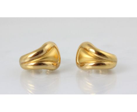 A pair of yellow metal hoop earrings, the stylised hoops with matte detail to the centre with plain polished detail to each s