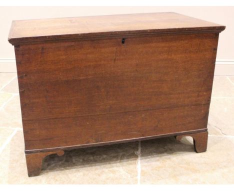 A 19th century oak blanket chest, the hinged cover opening to a vacant interior, upon bracket feet, 66cm H x 95cm W x 54cm D 