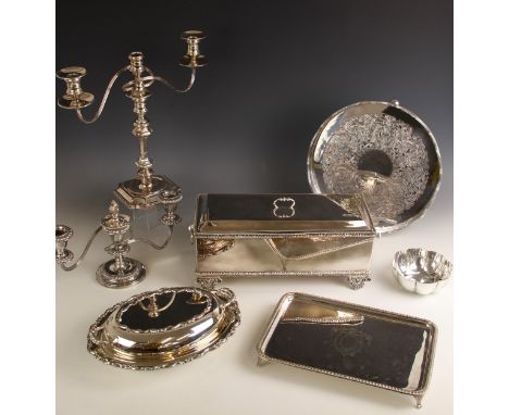 A selection of silver plated items, including a large rectangular table box, the hinged cover opening to reveal a compartment
