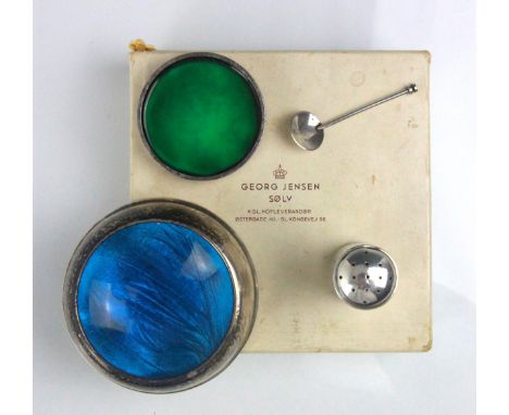 A part Georg Jensen condiment set, by Sigvard Bernadotte, comprising pepperette and enamel open salt, the open salt with gree