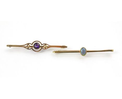 A selection of early 20th century jewellery, to include an opal set bar brooch, stamped ‘15ct’ 5.5cm long, an untested sapphi