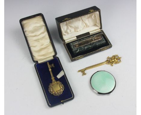 A selection of silver and gold coloured items, including a George VI silver and enamel compact, the pale green guilloche enam