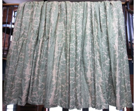 A pair of country house style toile de Jouy type curtains, the green printed floral design against an ivory ground, interline