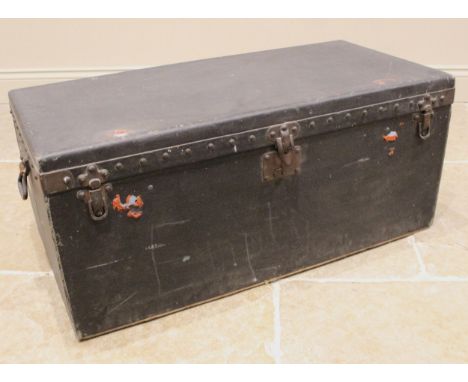 A Louis Vuitton Rexine covered car trunk, early 20th century, with a rounded back, applied side handles and branded catches, 