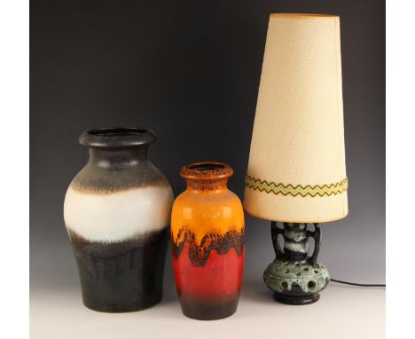 A West German 'fat lava' vase, mid 20th century, of tall ovoid form with flared neck, typically decorated in orange and red, 