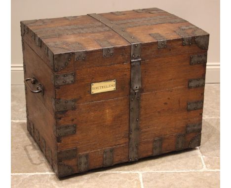 A 19th century oak and metal bound silver trunk, the gently domed cover applied with metal strapwork and integral clasp lock,