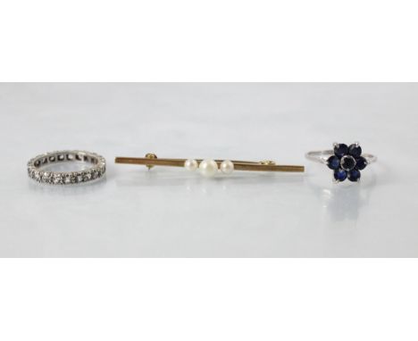 A selection of jewellery, including a 20th century full eternity ring, stamped indistinctly 9ct, ring size K, with a untested
