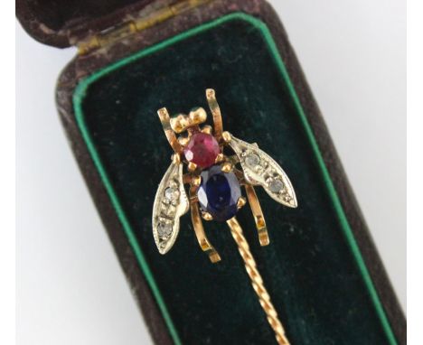 An early 20th century untested sapphire, ruby and diamond stick pin, the insect designed head set with untested ruby and sapp