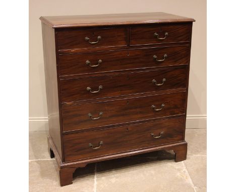 A George III mahogany chest of drawers, formed with two short over four graduated long, cock beaded and oak lined drawers app