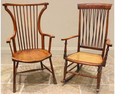 An ash Arts and Crafts Windsor elbow chair, late 19th/early 20th century, with curved top and side rails, a stick back over a