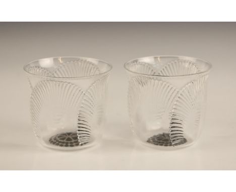 Two Rene Lalique 'Coquelicot' shot glasses, each modelled as a poppy flower with black enamel seed head detail to the base, e