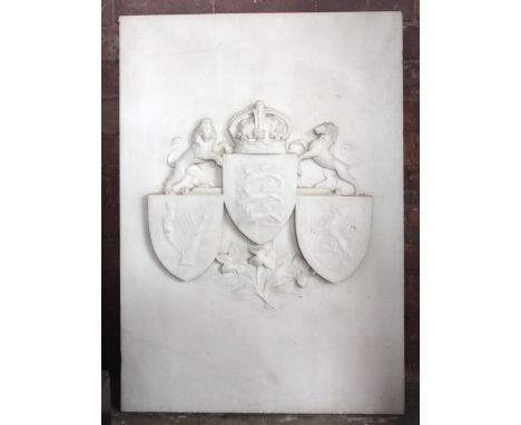 An unusual white marble heraldic plaque, late 19th or early 20th century, relief carved with the coats of arms of England, Sc