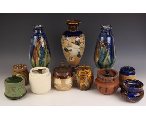 Eight tobacco jars, 19th century and later, to include a Royal Doulton stoneware example with brass cover, early 20th century