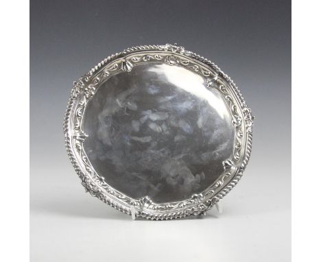 An Edwardian silver salver, William Hutton &amp; Sons Ltd, Sheffield 1902, the cast gadroon rim above garland detailed border