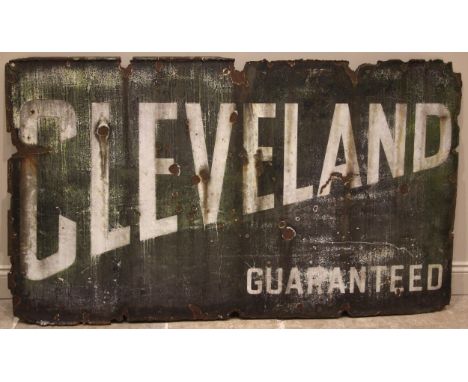 A Cleveland petroleum 'Guaranteed' enamel advertising sign, the white text upon a green ground, 104cm x 181cm (at fault)