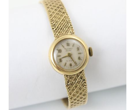 A yellow metal cased Rotary ladies wristwatch, the circular dial with baton and Arabic numerals, set to plain polished case, 