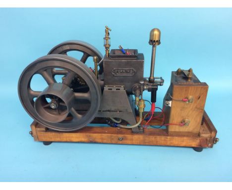 A Perkins Hopper Fed horizontal engine, stamped ' Genuine Trade Mark K-W, Made in USA', 48cm length, 24cm width x 31cm height