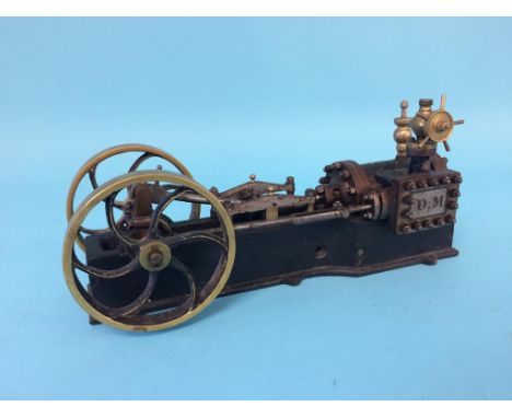 A model horizontal beam engine, stamped D.M., 29cm length