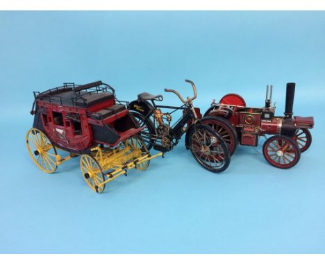 A Franklin Mint 'Wells Fargo and Co. Overland Stage Coach', a model traction engine and a model Harley Davidson (3)