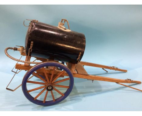 A model horse drawn water bowser 