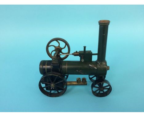 A miniature traction engine, 14cm wide, 14cm height