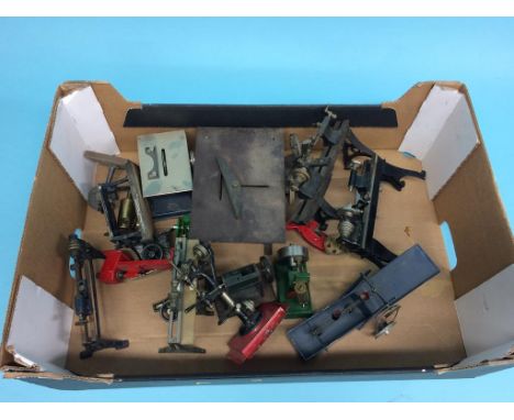 A box of miniature engineering machinery to include; lathes, wood saw, grinder, pillar drills etc.