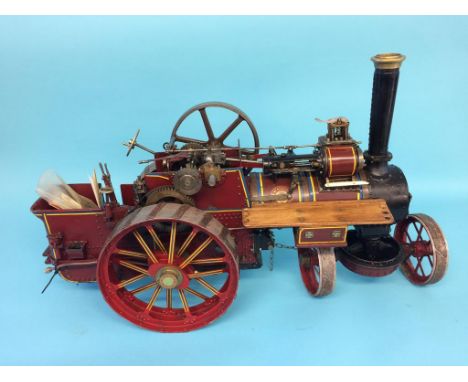 A live 1 ½ inch scale steam model traction engine, William Allchin of Northampton.  65cm width x 43cm height