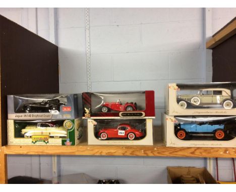 Six boxed Die Cast model cars 