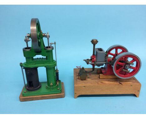 A Redwing horizontal petrol Hit and Miss engine, 35cm width x 18cm depth and a vertical hot air engine.  17cm width x 28cm he