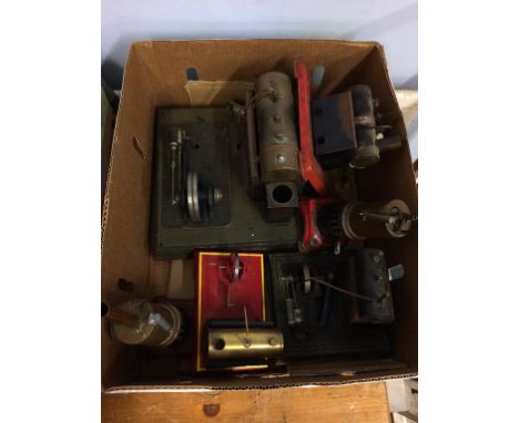 A quantity of part model tin plate engines