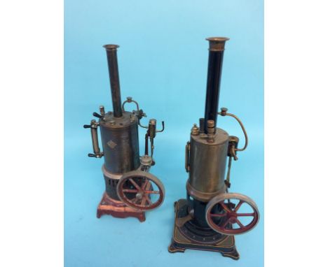 A single spirit fired model engine labelled B.W. and another G.B.N. (2)