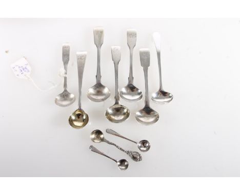 Group of silver mustard, caddy and salt spoons, 81g gross.