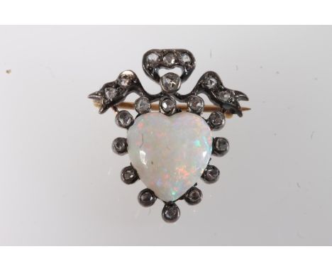 Unmarked gold plated white metal opal and rose cut diamond brooch of heart and ribbon bow form, 3.2g.