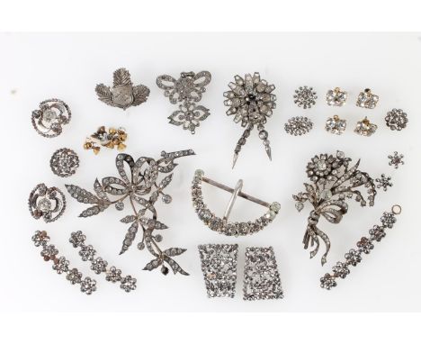 Sterling silver and white stone set floral spray brooch, the reverse with makers mark 'ST', a larger similar brooch with 'sta