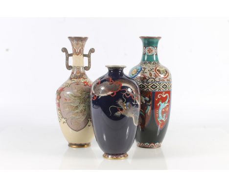 Three late 19th century Chinese or Japanese cloisonne enamel vases.