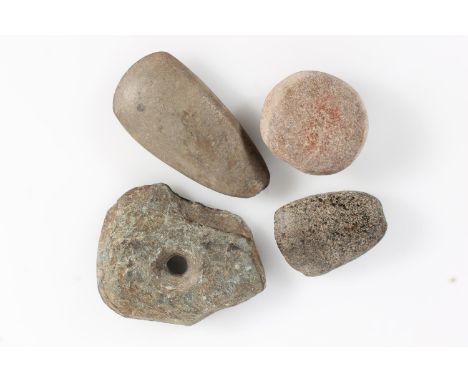 Antiquities, two early stone axe heads, a burr type stone and another. (4)  Not sure the country of origin