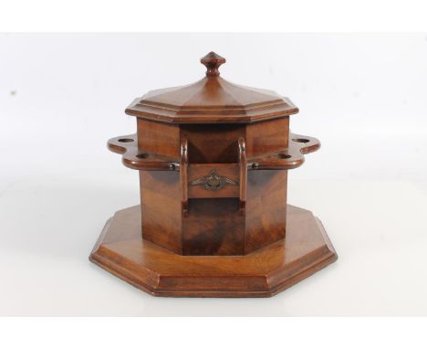 Early 20th century mahogany combination pipe stand tobacco box with two RFC (Royal Flying Corps) badges, six sections for pip