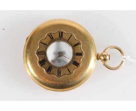18ct gold cased half hunter key wound pocket watch, the case with engine turned decoration and blue enamel chapter ring, the 