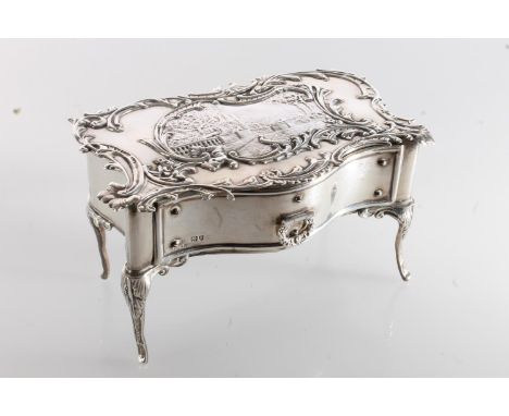 Novelty silver jewellery casket in the form of a French Rococo style commode or bureau plat with pull out drawer, by William 