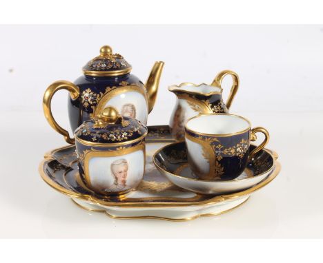 Sevres Chateau de Fountainbleau porcelain breakfast set comprising circular tray, teapot, sugar bowl and cover (sucrier) crea