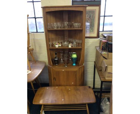 A light elm Ercol corner cupboard, coffee table and kidney nest of tables.