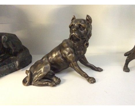 A seated bronze bullmastiff.