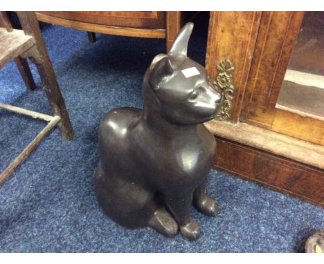 A bronze figure of a cat.