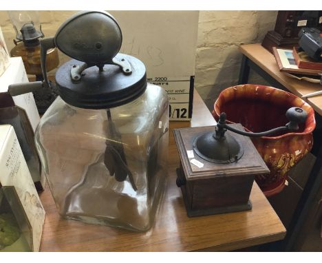 A butter churner and a coffee grinder.