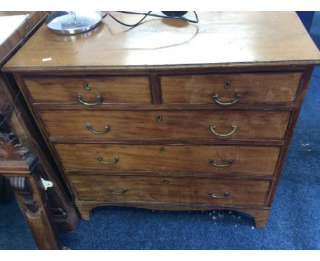A Georgian mahogany chest of drawers fitted with three long, two short drawers on bracket feet.