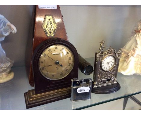 Oak cased metronome, two clocks, tuning fork, telescope and cigarette lighter.