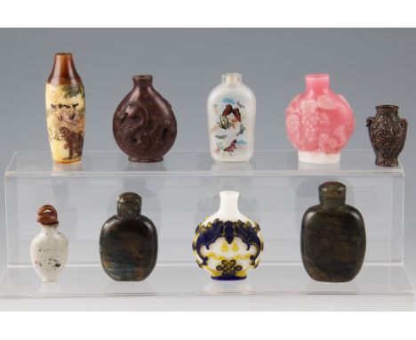 A group of nine assorted Chinese snuff bottle bodies to include hard stone, cameo glass, internal painted glass, porcelain, b