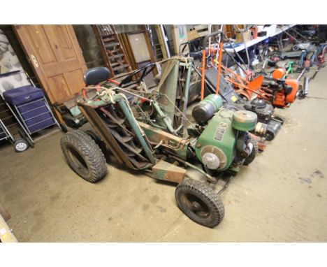A vintage National self propelled gang mower with JAP engine