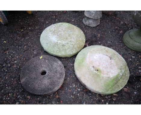 Two saddle stone bases and another concrete garden plinth